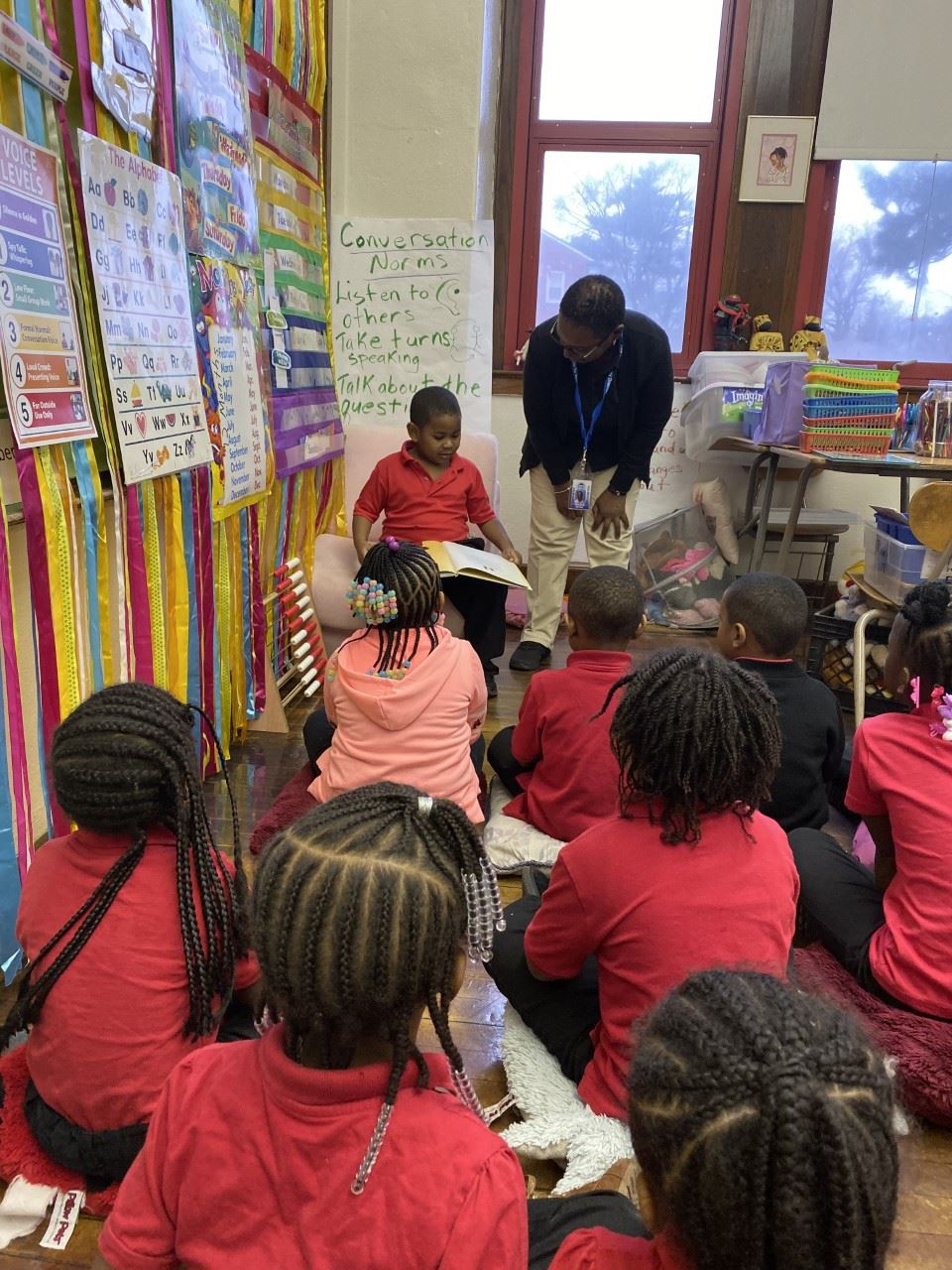 student reading to class student reading to class